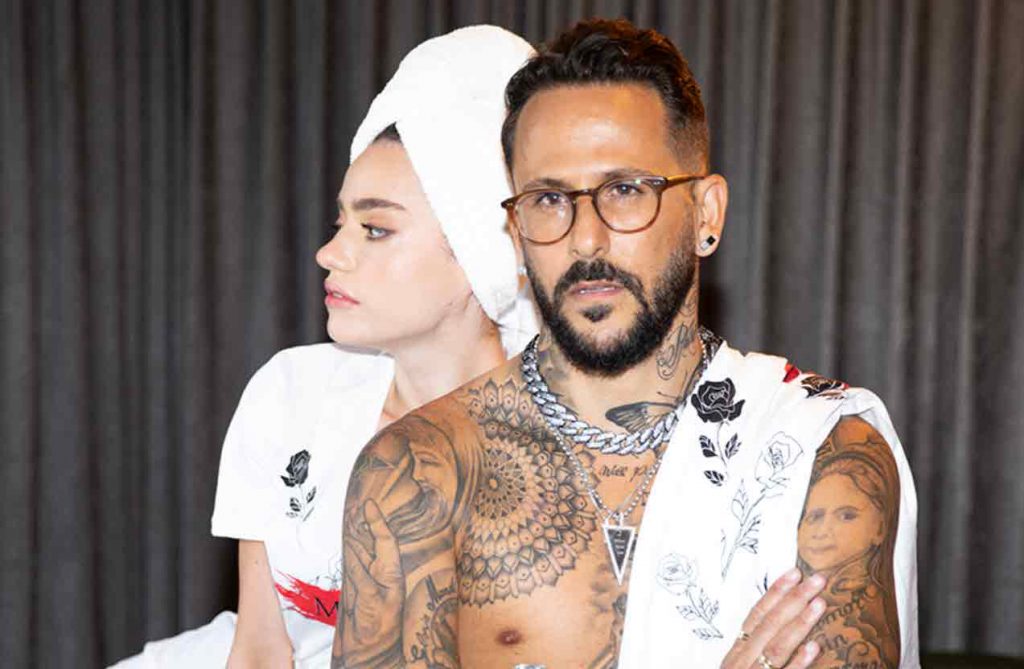 אסי בוזגלו משיק אתר חדש ותמונות לוהטות לצד דוגמנית!